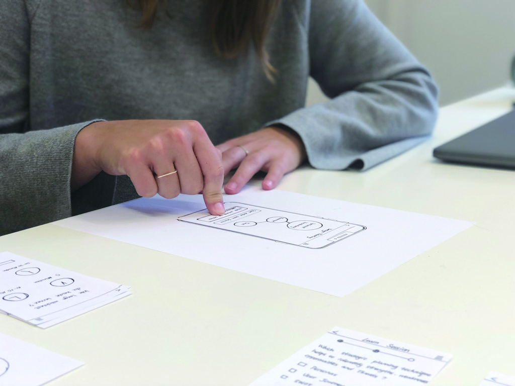 AI&U — a learner walking through the paper prototype